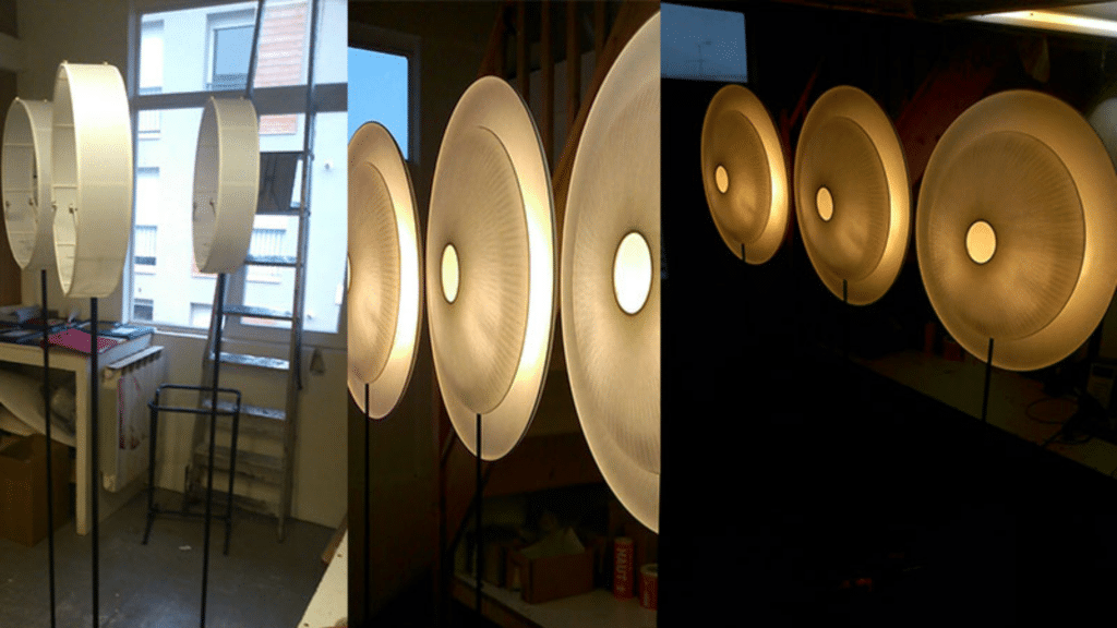 Trois étapes de la fabrication et de l’éclairage de lampadaires circulaires en atelier
